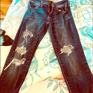 Girls size 4 AE dark blue jeans with holes